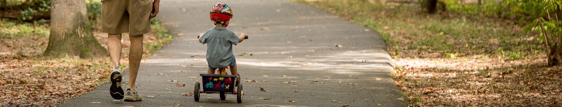 kid riding tricyle with grandpa arlington county virginia