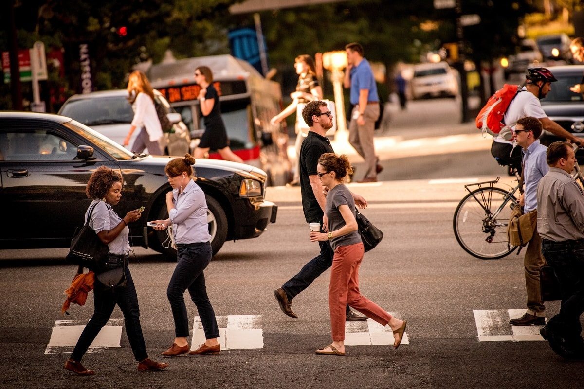 Pedestrians walking in a crosswalk in arlington