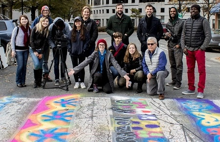 Arlington PAL volunteers with painted crosswalk